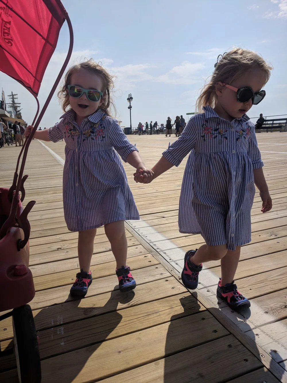 A wagon like this with a canopy can save you from carrying your kids all the way down the boardwalk. Unless they decide they won't go in it. Because toddlers. But at least my twins look cute, right?