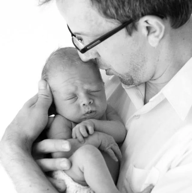 My son Elliott as a newborn. Now he's basically driving and going to prom.