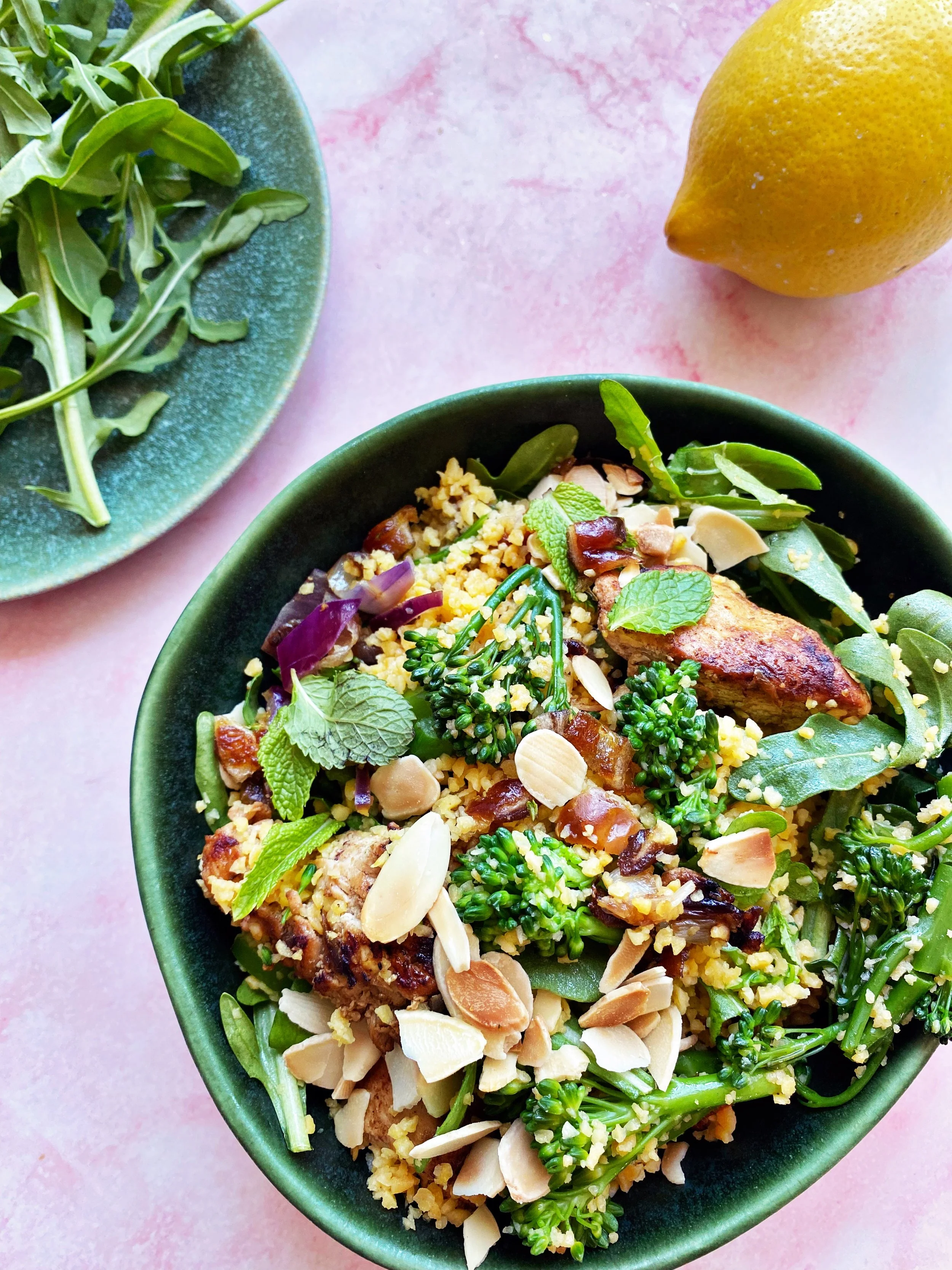  Balanced grain bowl with broccoli, lean chicken and herbs 
