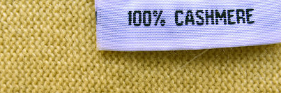 Step 1. Check the Label An easy giveaway for low-quality cashmere products can be identified simply by the product contents printed on the product's label. Companies are required by law to list the percentages of materials used, and therefore you should only select items that are listed as "100% CASHMERE". Anything less than 100% indicates a cashmere blend, usually of lesser quality. While blended fabric can still yield quality clothing, this should be reflected in a lower pricepoint. 