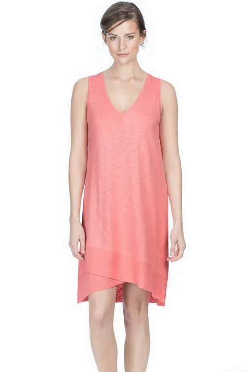 This ribber dress by Lilla P falls perfectly over troublesome areas for the apple body type. The asymmetrical hemline draws attention away from the midsection and redirects the eye to the legs instead. Likewise, the V-neck cut creates an element of interest and provides some skin exposure, while allowing the body of the dress to gently flow over the middle. 