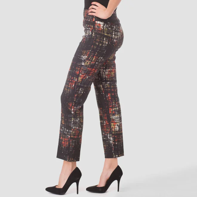 This same concept of abstract design can be seen in our Joseph Ribkoff Mixed Pant . The pattern takes away from the plaid trend through incorporating elements of the tartan pattern with crossed lines and overlapping squares. Although more of a stretch from the typical plaid style, this pant is on trend with fall fashion without feeling forced. 