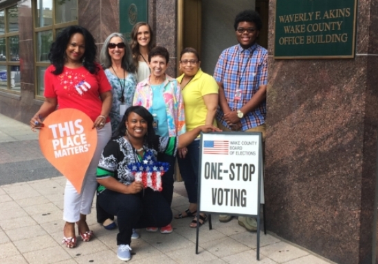 Staff outside the Board of Elections office, with Angel Perkins holding star. Photo courtesy of Angel Perkins.