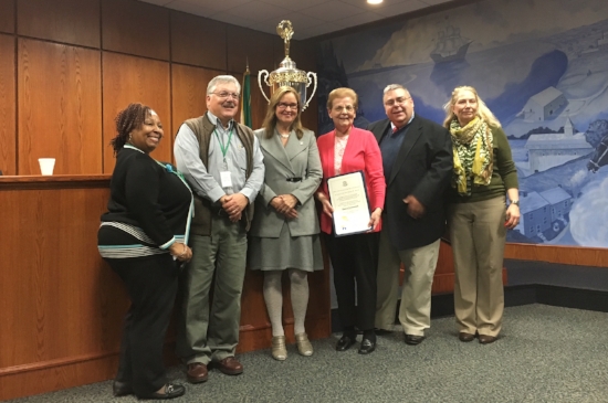 Registrar of Voters staff members receive Democracy Cup award, with Fred DeCaro III second from right. Photo by Mary DeCaro.