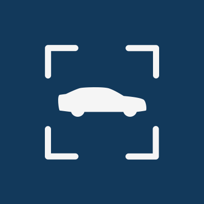 The user holds up their phone to the vehicle and walks around it so the app can gain understanding of its surroundings.
