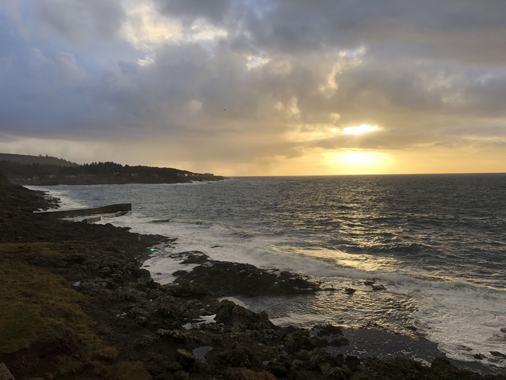 I took a day trip out to the Oregon Coast a few weeks ago. This was the sunset I saw at Depoe Bay. It doesn’t have much of anything to do with the rest of this post; I just thought it was a nice photo, and hey, if you wanna read some symbolism in a sunset, far be it from me to stop you.