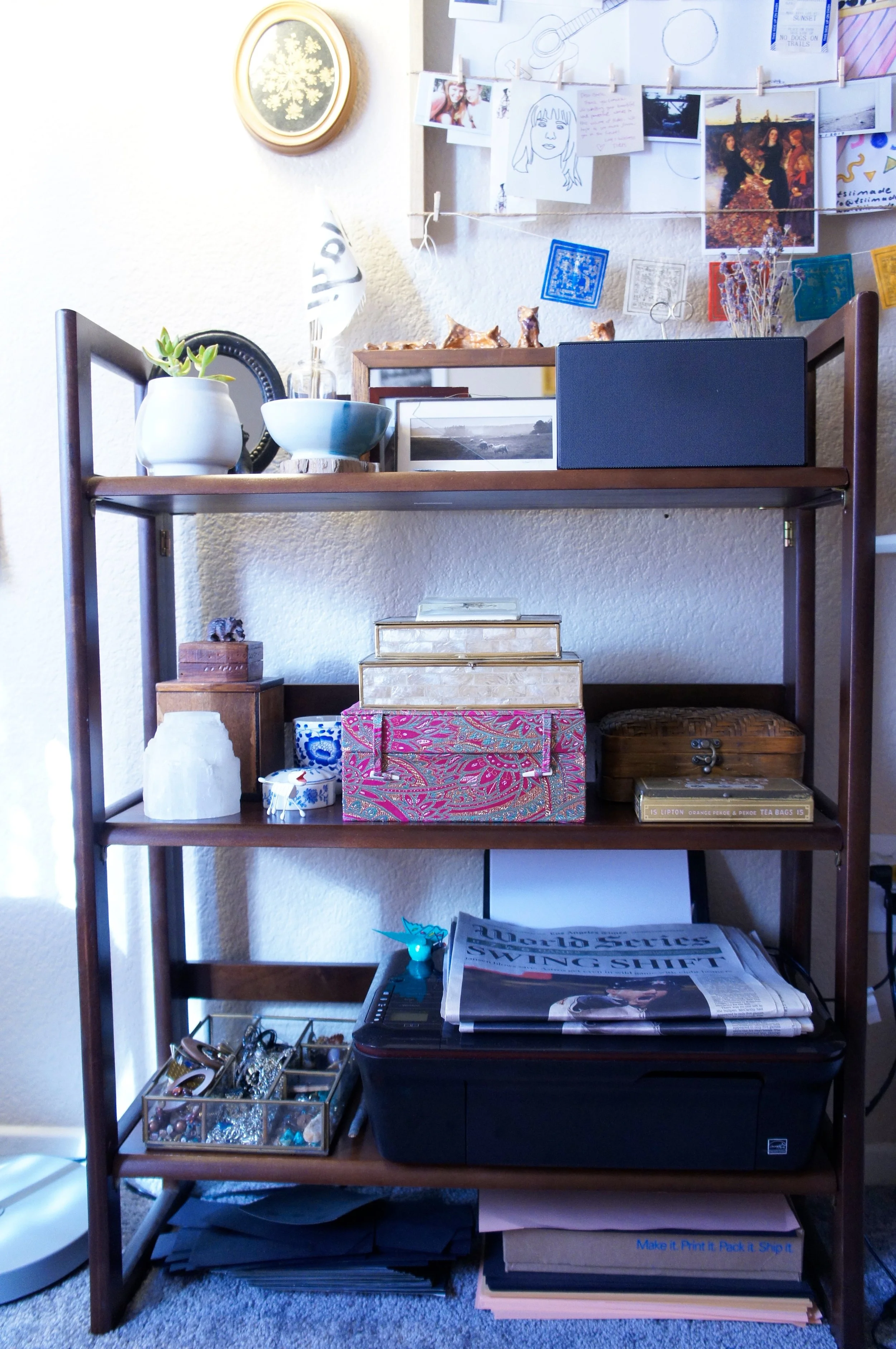 I store my jewelry supplies in my vintage box & tin collection. also shown: la times featuring my block cloth shirts , waiting for frames. try displaying any press on your work in your fame gua.