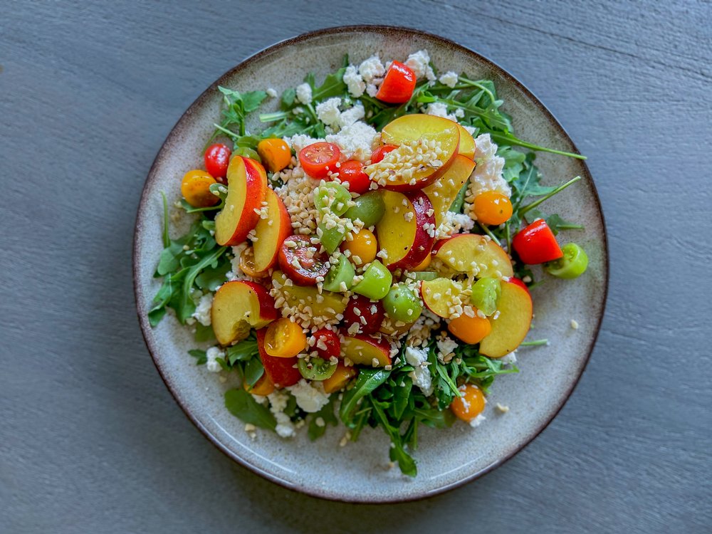 Peach and tomato salad with orange blossom and honey dressing