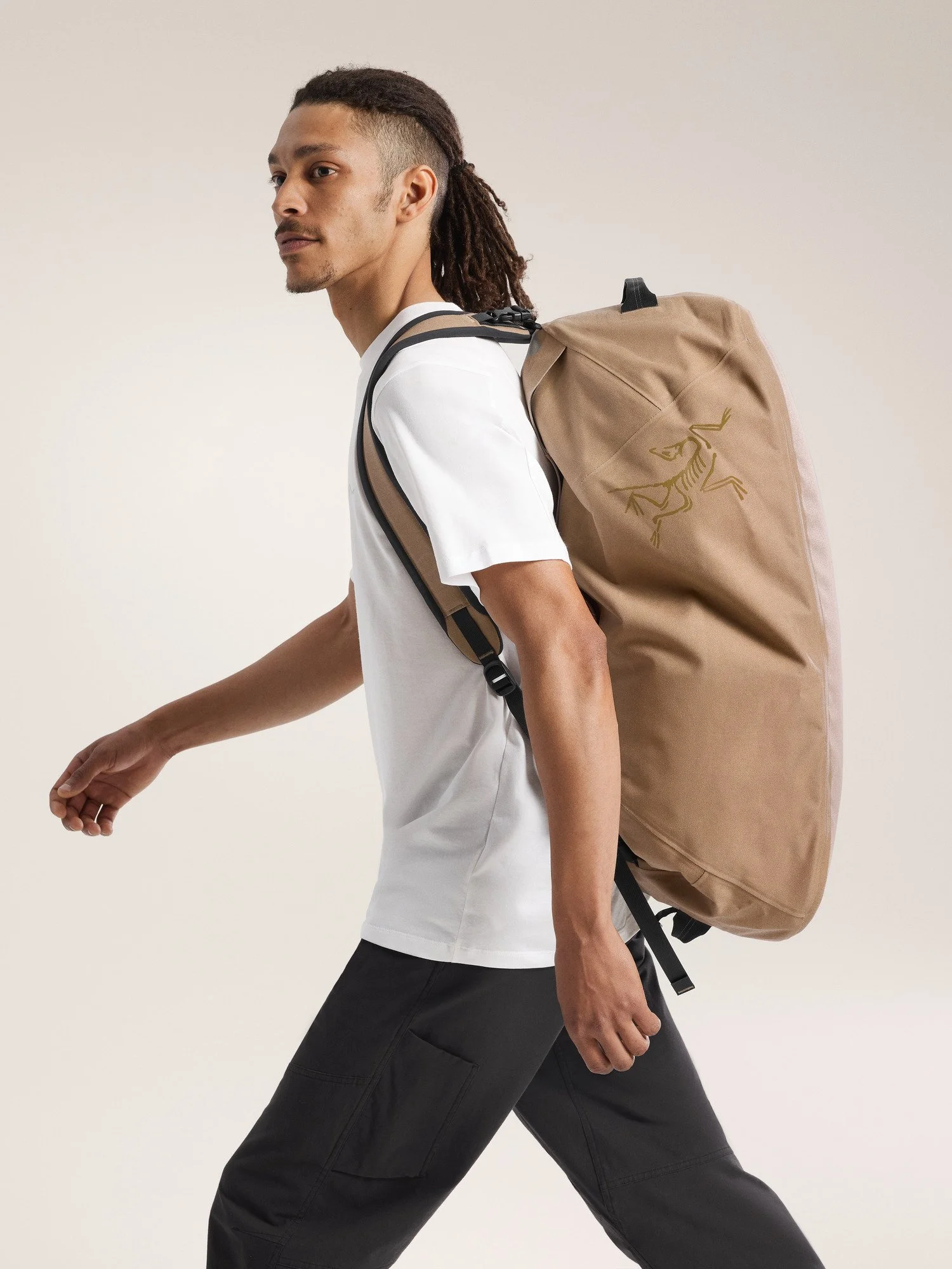 S25-X000007474-Carrier-75-Duffle-Canvas-Side-View.jpg