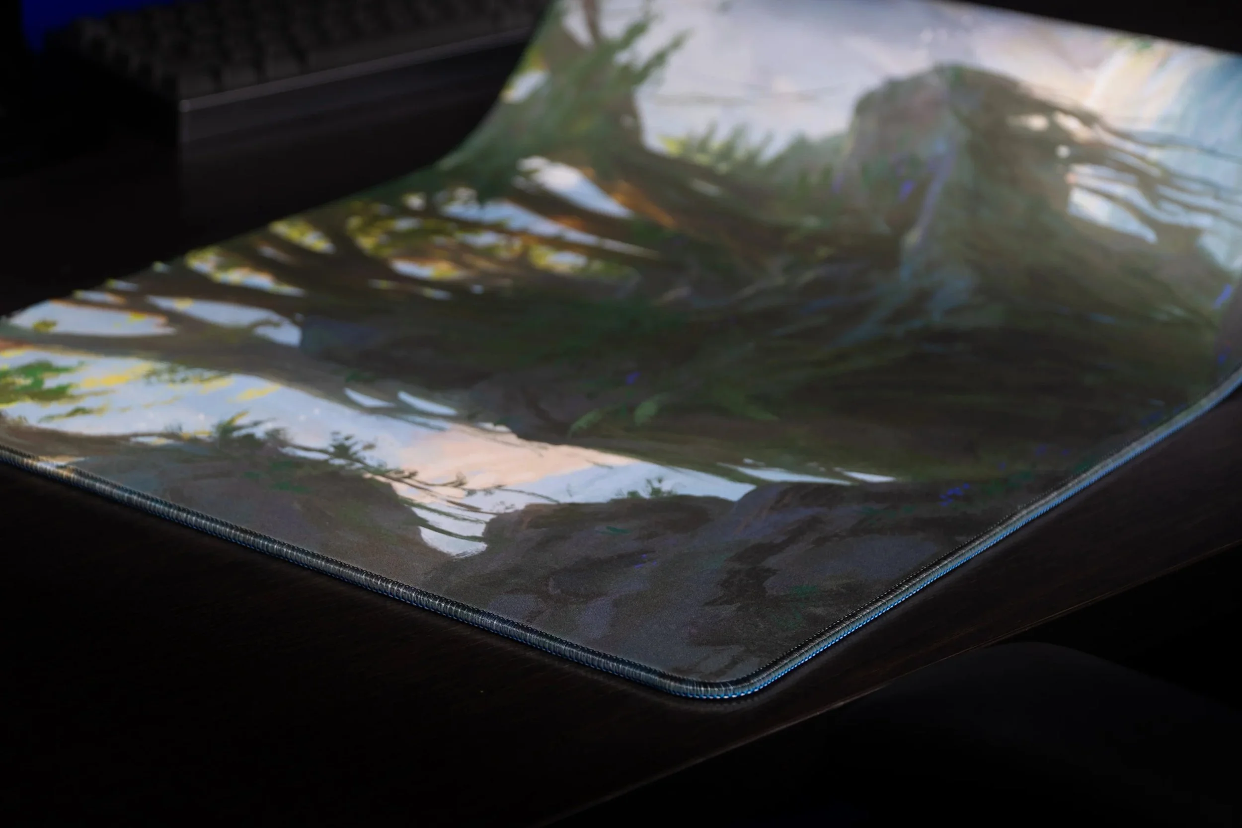 nick-ragetli-lake-of-laugg-deskmat-forest-art-corner.jpg