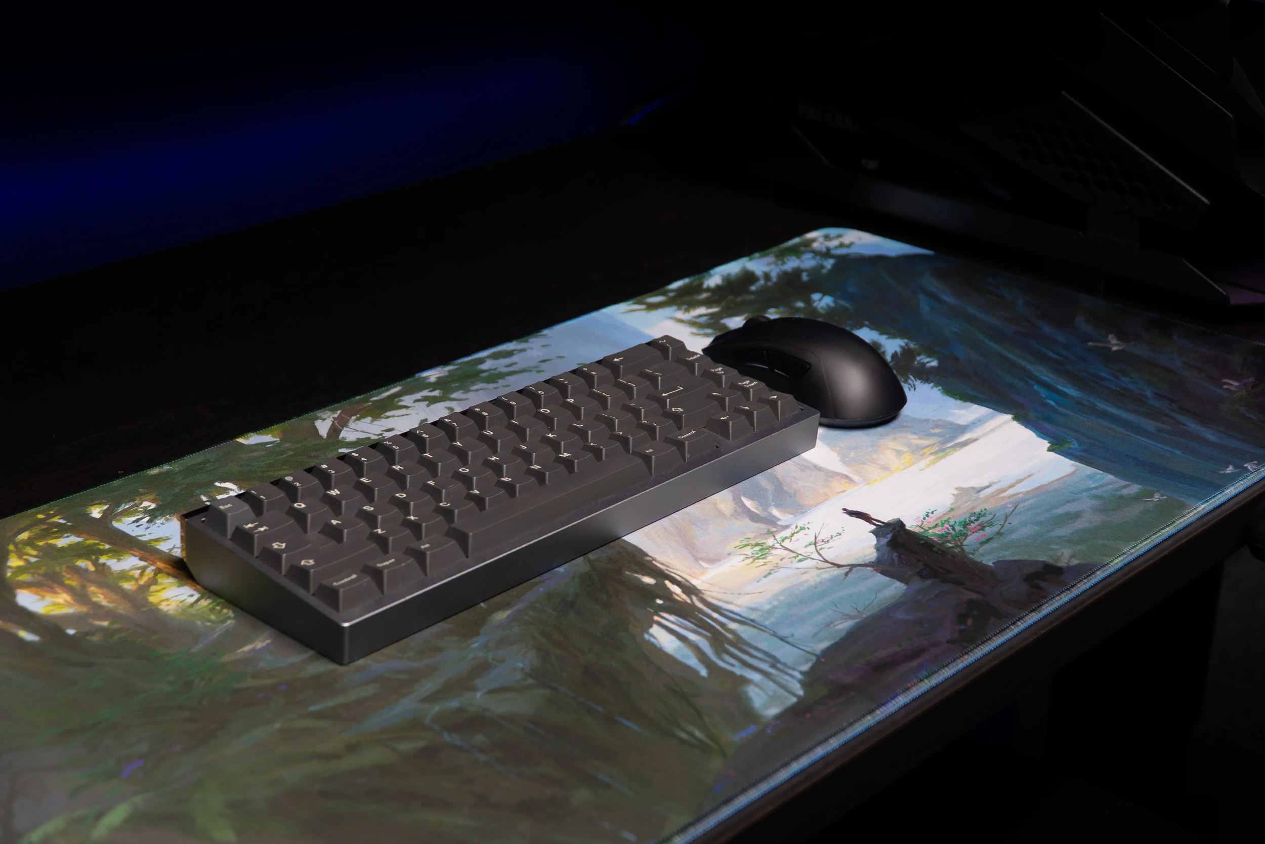 nick-ragetli-lake-of-laugg-deskmat-keyboard-mouse-view.png