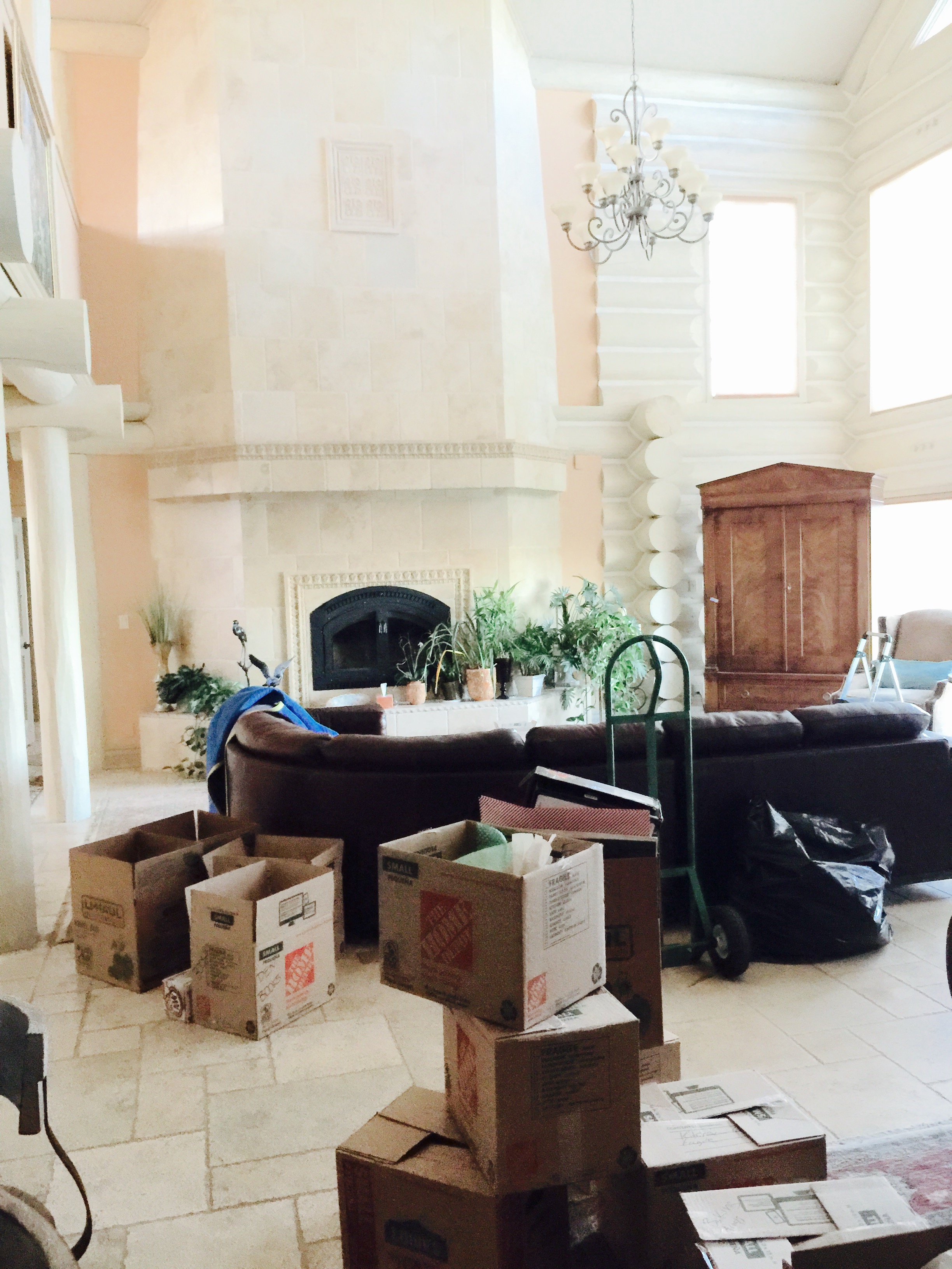 Before photo of the living room from the dining room.
