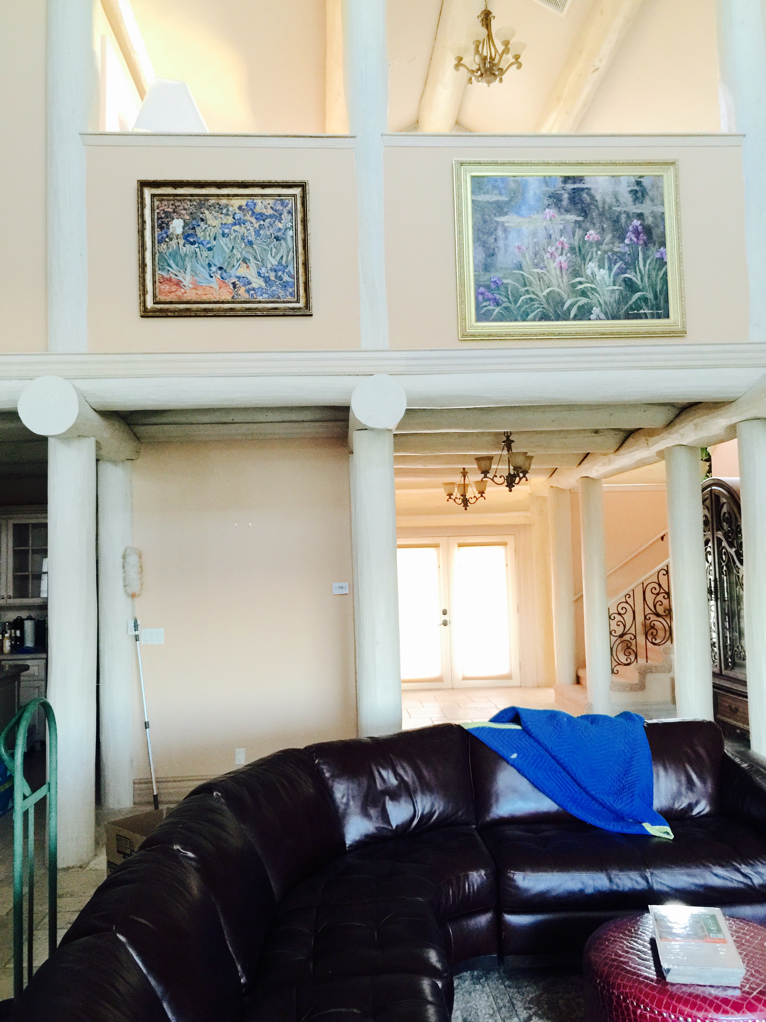 Initial living room configuration with the couch blocking entry into the living room and disrupting the flow.