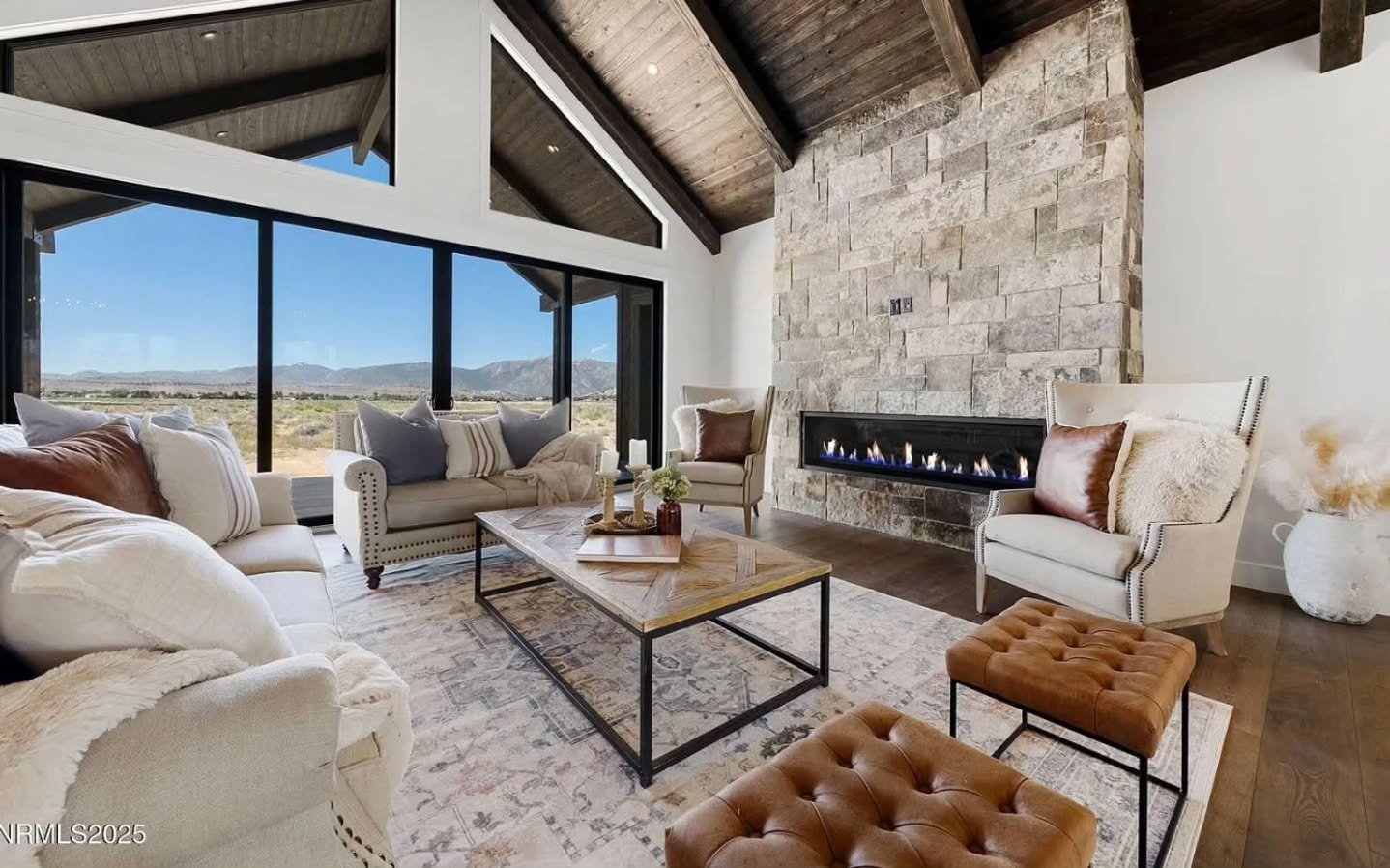 #newlisting - This new custom home sits on over 5 acres with stunning views of Job&rsquo;s Peak. The gorgeous new build features an open layout and cozy amenities, including a fireplace and a chef&rsquo;s kitchen. Our goal was to help buyers picture 