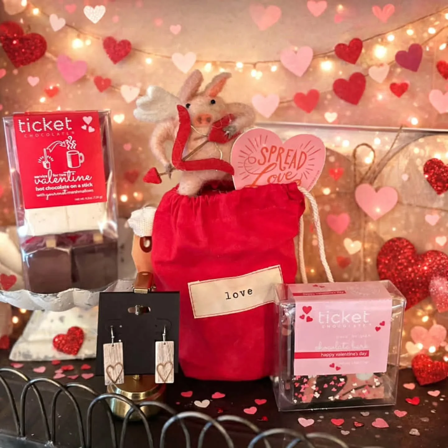 Need a darling gift for Valentine&rsquo;s Day but don&rsquo;t know where to start? Let us custom make one for you! 🩷 Ranging from chocolate to jewelry or even a Cupid pig himself, we can put together a little bag of love no matter what your budget i