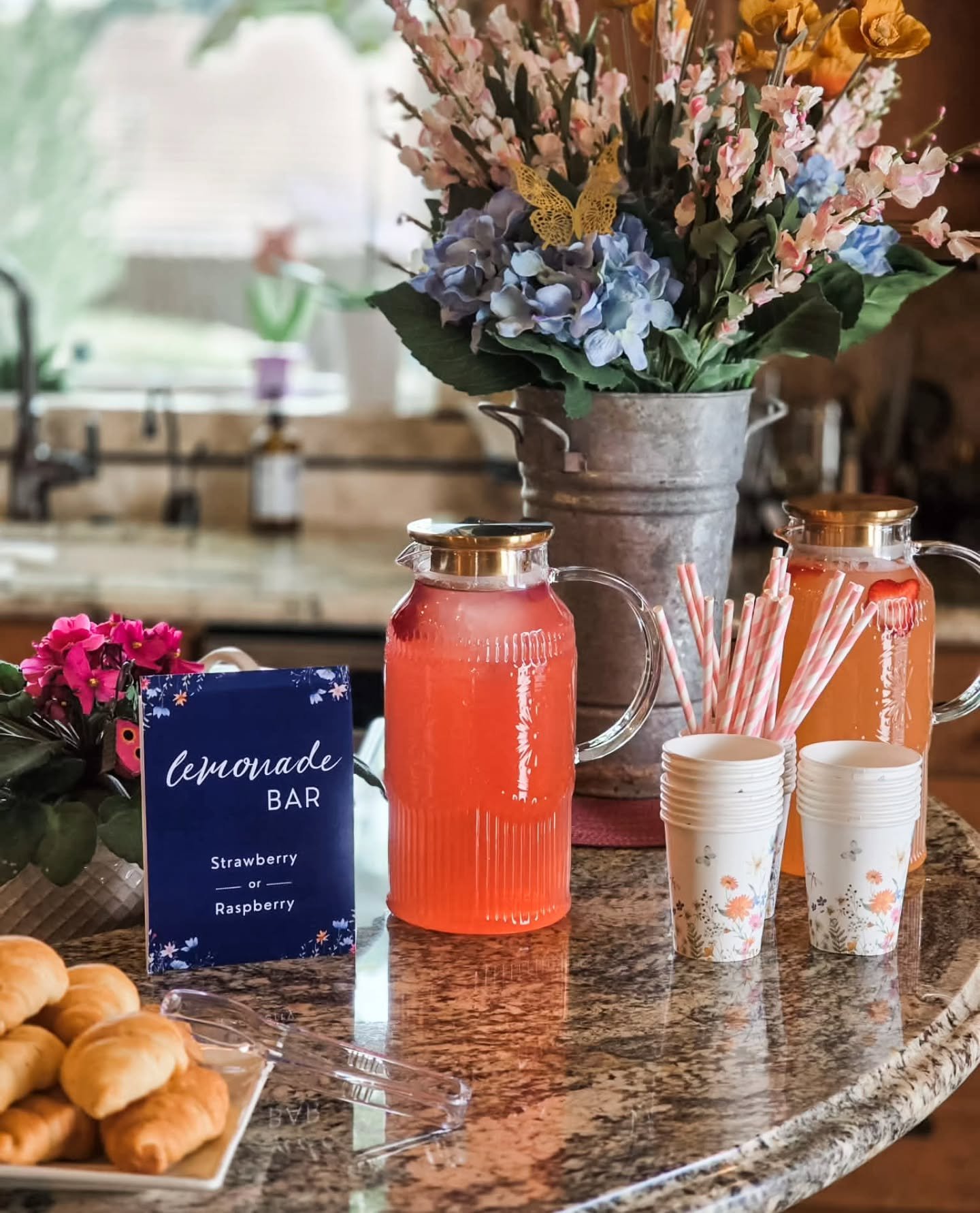 We're biased, but we think faux flowers from Eddy Street make the best party decor 😍 look at how fun this floral bridal shower from one of our customers turned out 💐🦋🪻