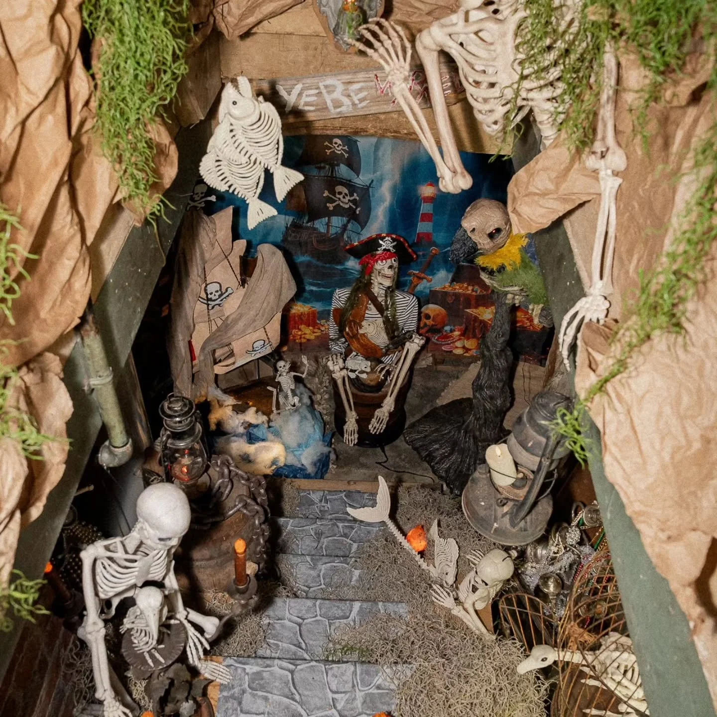 Ahoy, mateys! There's something spooky lurking below deck at Eddy Street! Janet has worked her magic once again, transforming our basement into a skeleton pirate's hideaway! You can't venture below deck, but it's worth a peek!

Come sea for yourself 