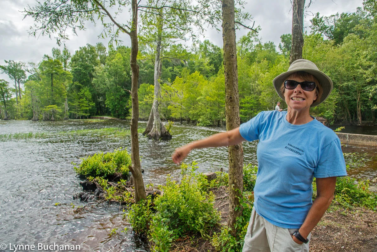 Christine Ellis Discussing the Lake and the Dam