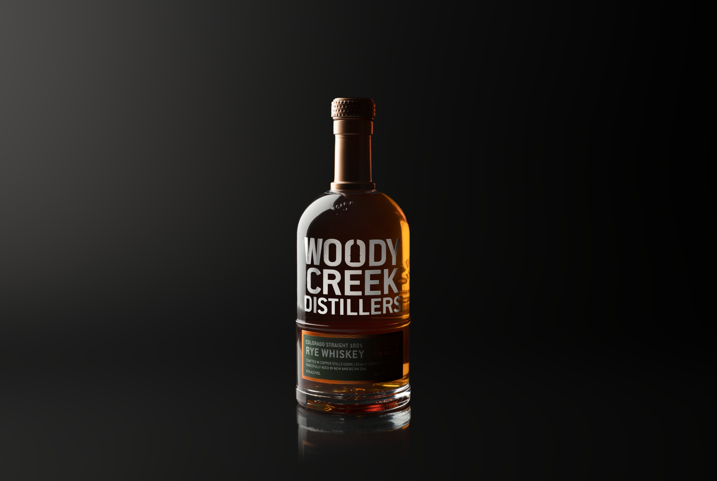 WoodyCreek_BottleShoot_RyeWhiskey_Black_Edit2.png