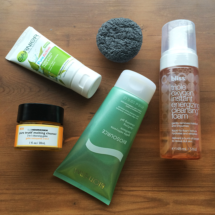 Clockwise From The Left: 1) Ole Henriksen Pure Truth Melting Cleanser, 2) Garnier Pure Active Neem Face Wash, 3) Boscia Konjac Cleansing Sponge With Bamboo Charcoal, 4) Bliss Triple Oxygen Instant Energizing Cleansing Foam, and 5) Biotherm Clarifying Cleansing Gel