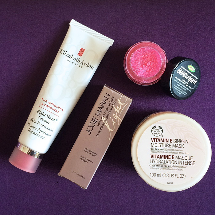 From Left To Right: 1) Elizabeth Arden Eight Hour Cream, 2) Josie Maran 100% Pure Argan Oil Light, 3) Lush Bubble Gum Lip Scrub, and 4) The Body Shop Vitamin E Sink-In Mask