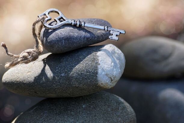 Canva - Key on a Stack of Stones.jpg