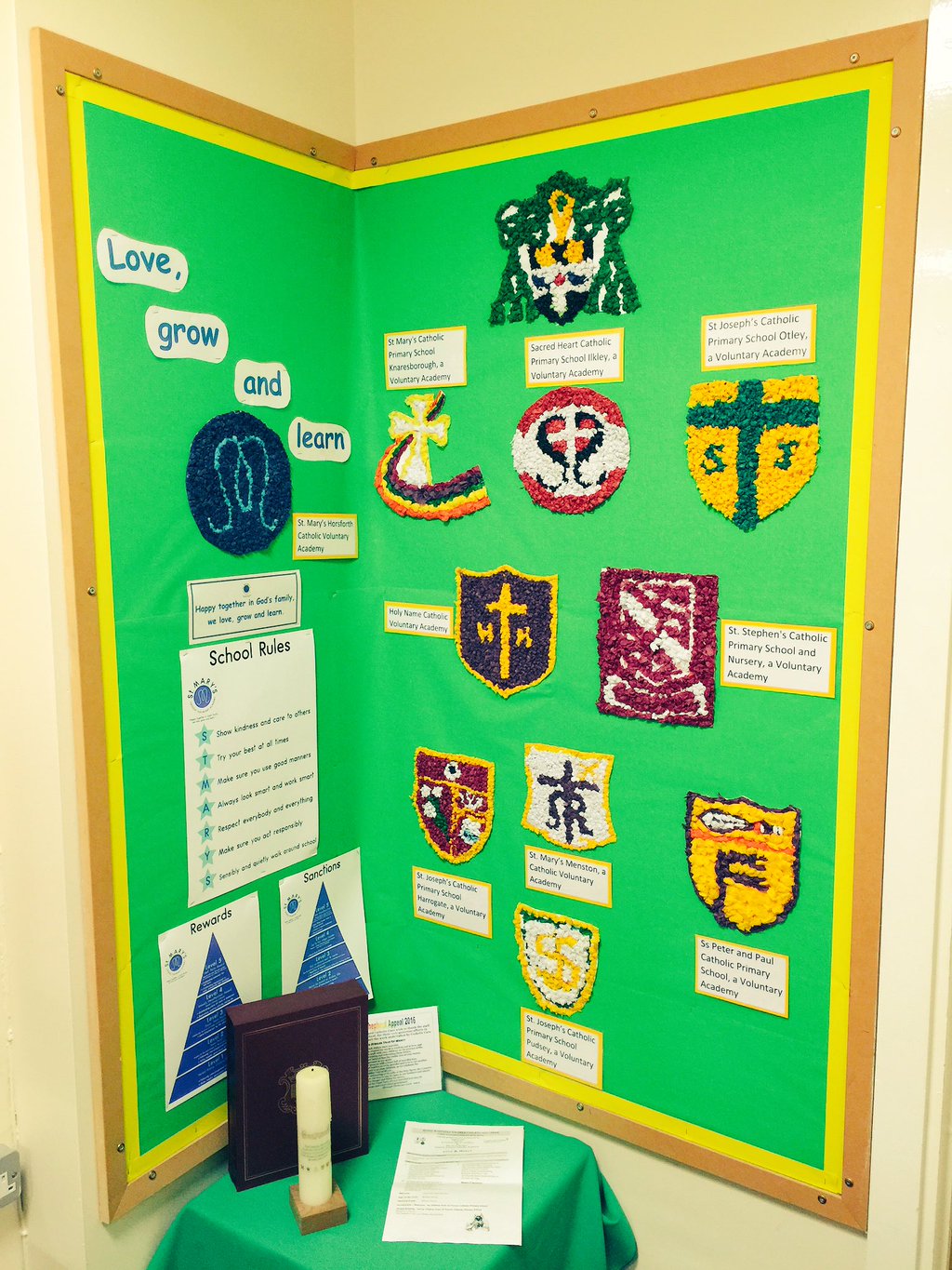 Photo: Each school's badge has been skillfully recreated in a medium which required simplifying the elements of each badge.