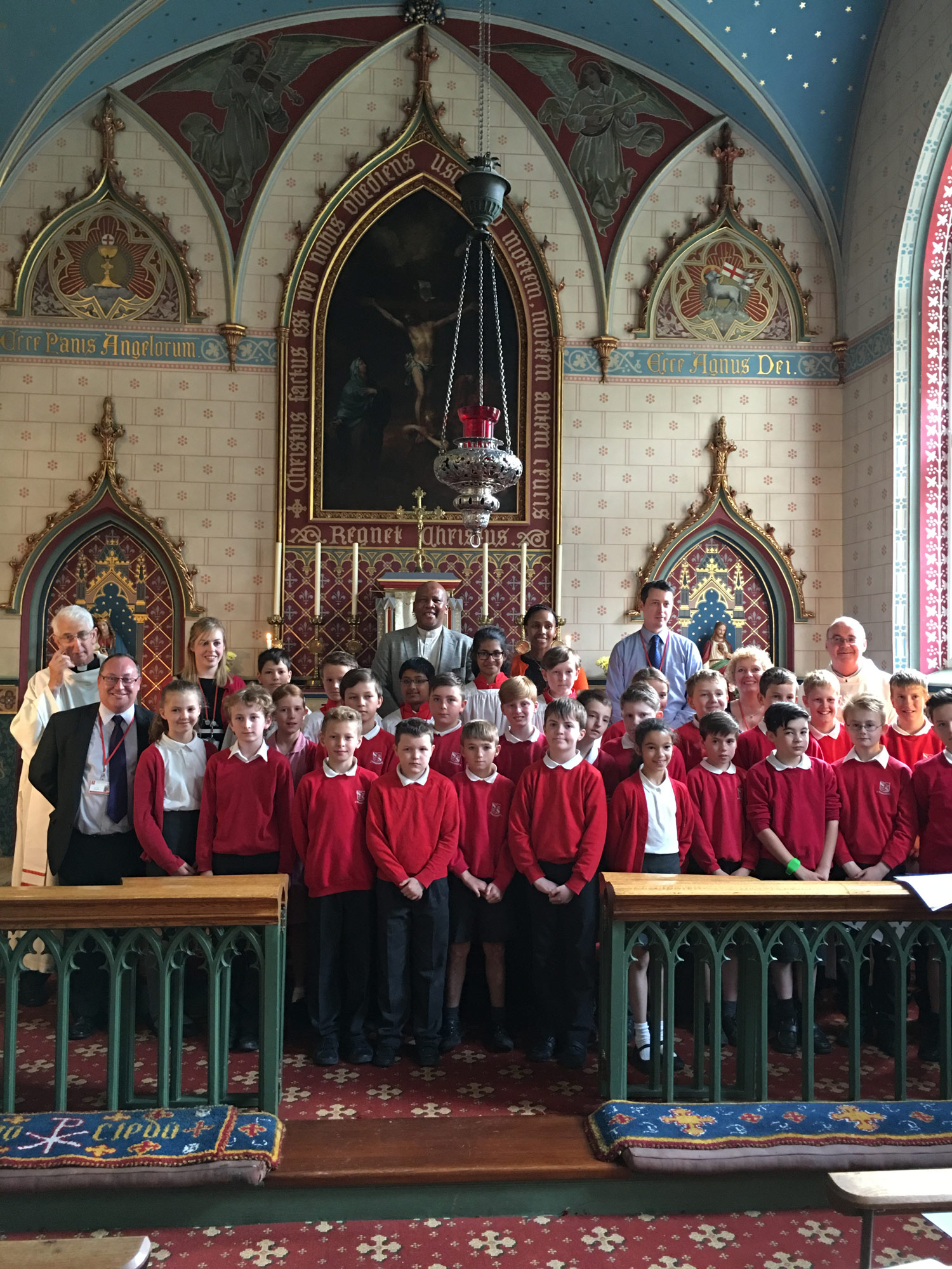 Photo: Fr. Matthew Burns, Mr Pye, Miss Bradley, the King and Queen of Lesotho, Mrs Yearby, Mr Curley, Mgr Andrew Summersgill and the Year 6 children