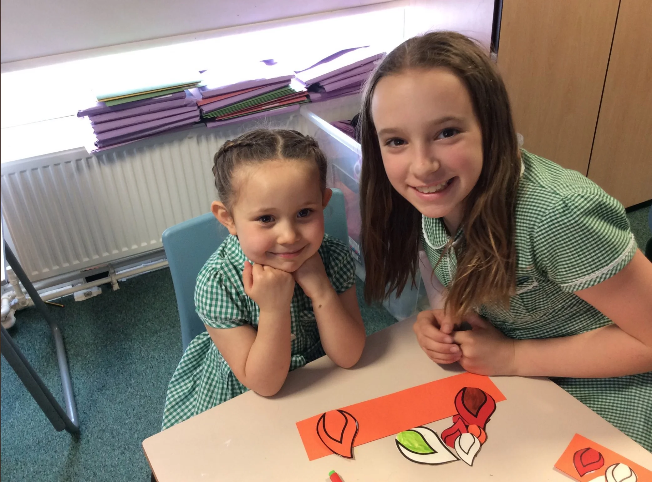 Photo: St Joseph' Otley Year 6 spending times with their buddies in Reception class preparing for Pentecost Celebration Day on May 18, 2018