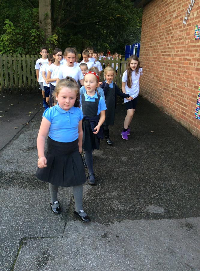 Taking part in the mile walk event