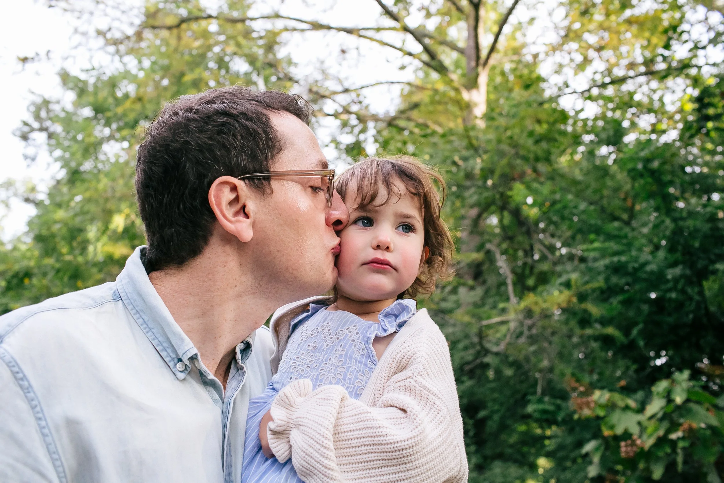 family-photographer-near-me-kissing.jpg
