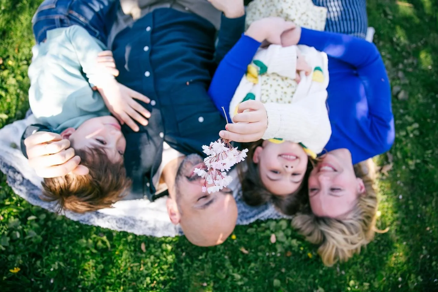 This sweet family had their backs on a blanket, faces in the sun and took time to pause with some spring flowers.

The warmer temps are coming again on Friday, just in time for my spring minis. I have 2 spots left for some evening glow. Link with inf