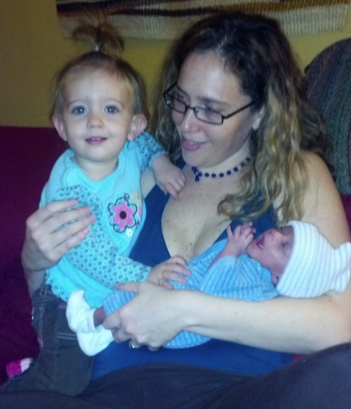 My daughter Lily and I and our first foster baby at nine days old.