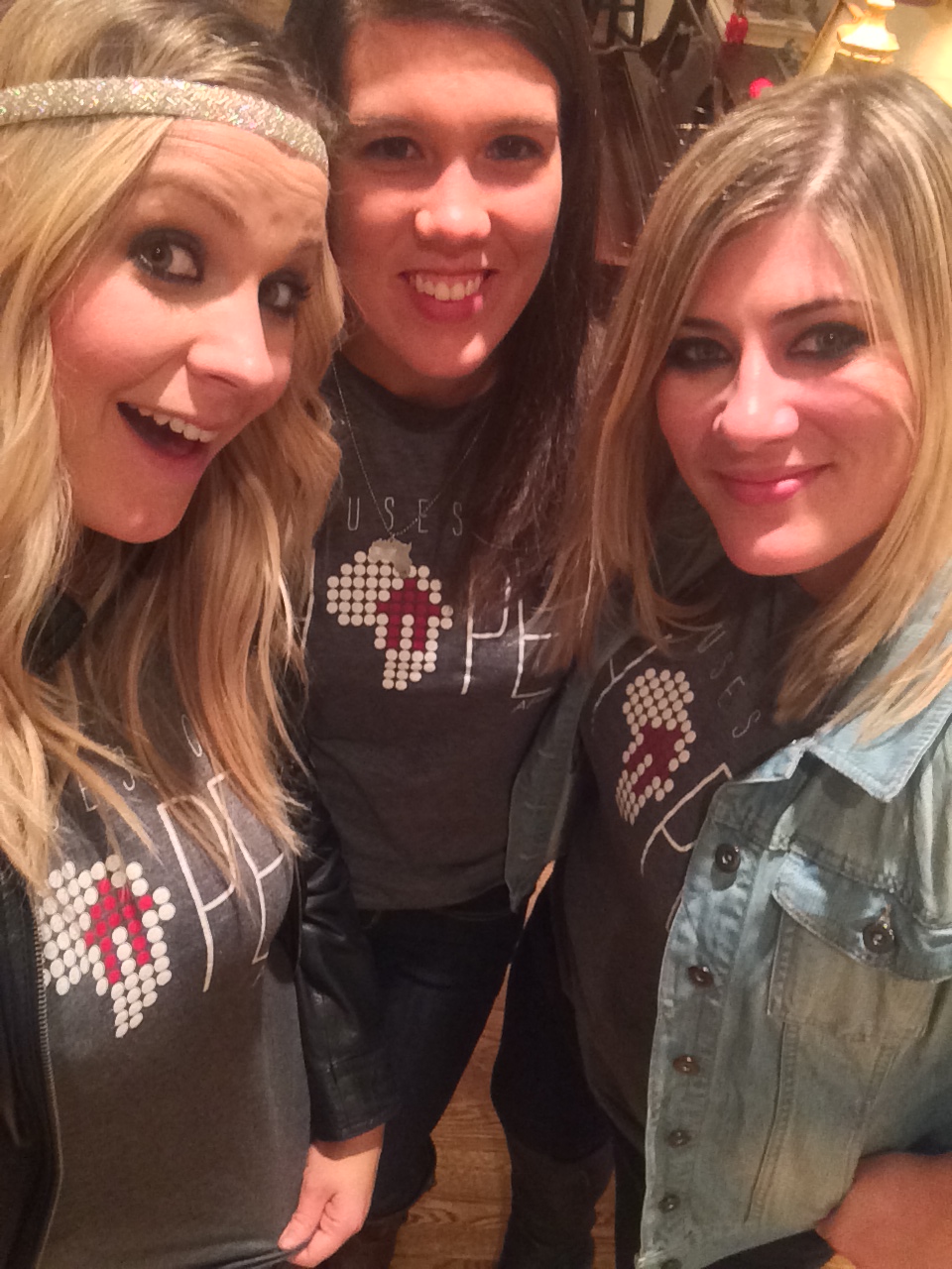 3 girls in Houses of Hope Africa t-shirts. Abby, always showing up. So great. Love her. 