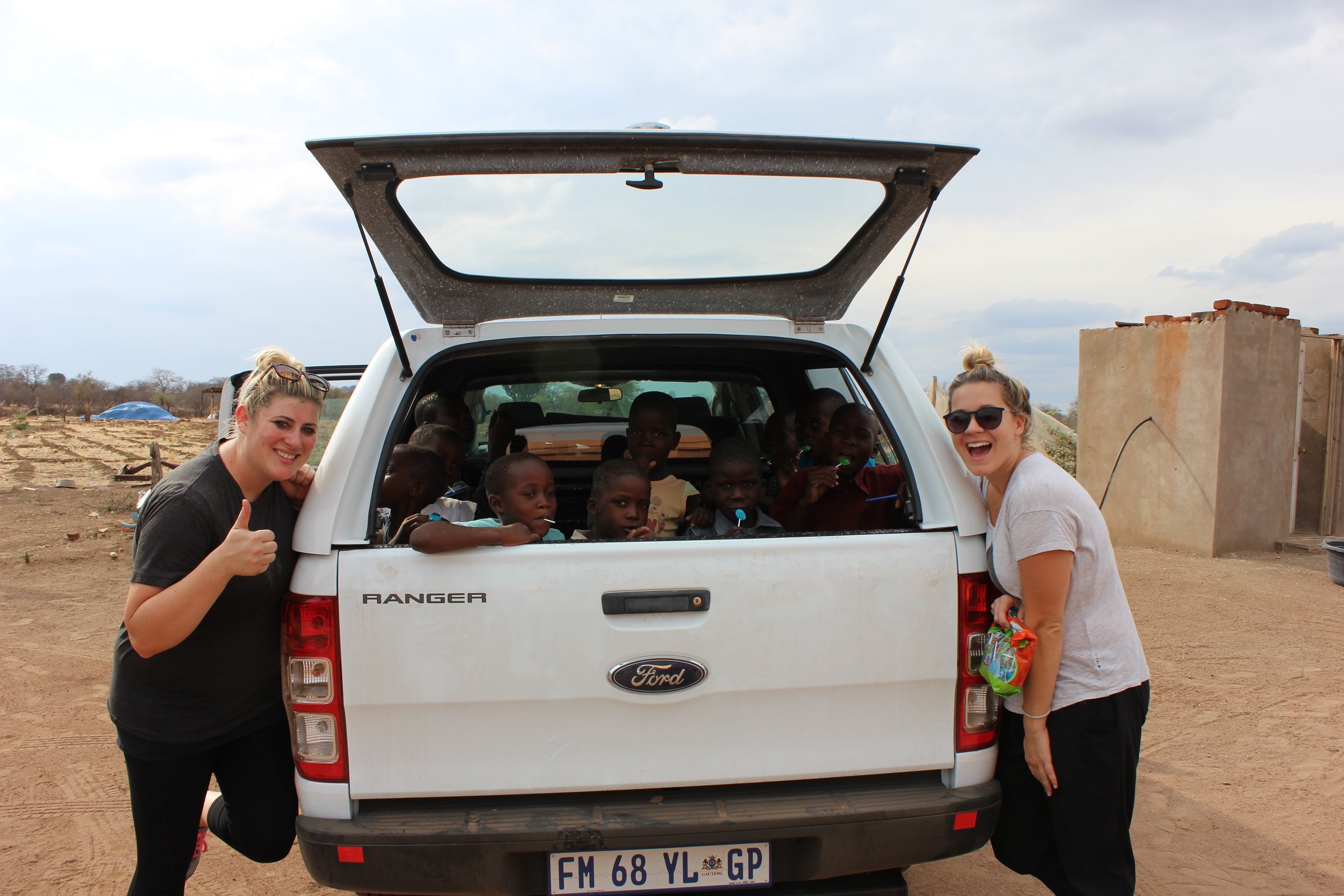 Thumbs up in the back of the truck!