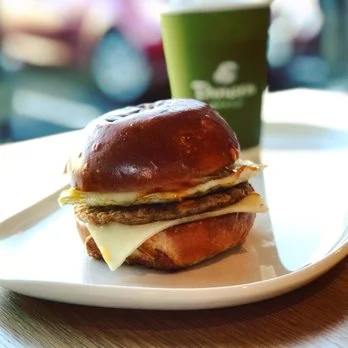 Had one of these guys this morning. They have these new spreads you can put on them...try the sweet maple spread. YUM. Go with the brioche bun. You're welcome.