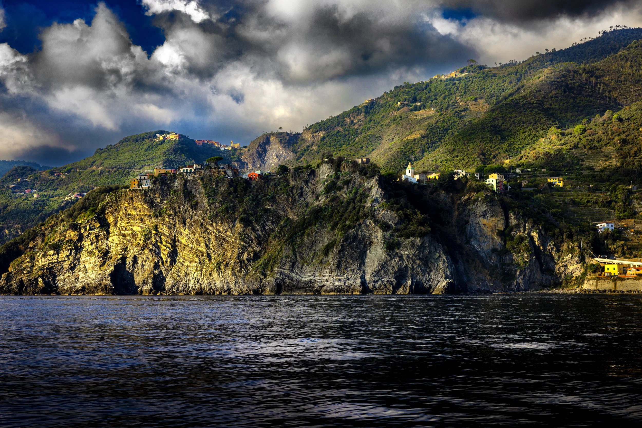 Cinque Terre  PASSING OF THE STORM  The tiny little villages become illuminted as the storm passes at sunset..jpg