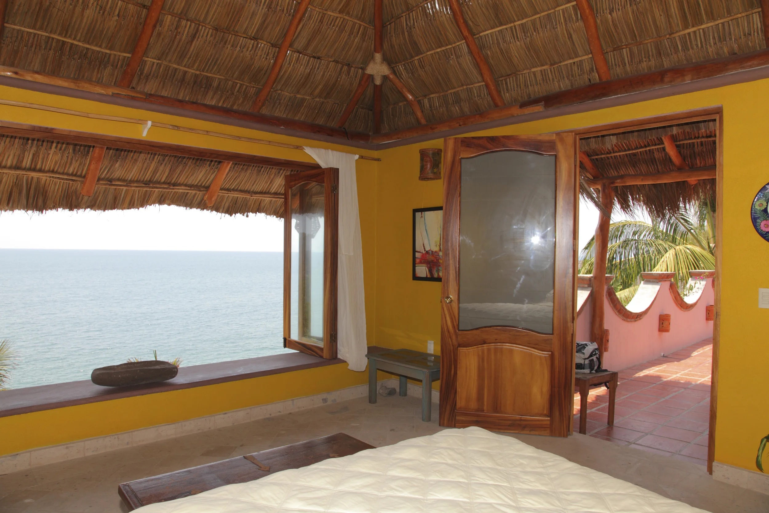 The master bedroom has been designed for maximum viewing pleasure. With unobstructed views of the ocean there's really no need to get out of bed (at least not until late in the day).