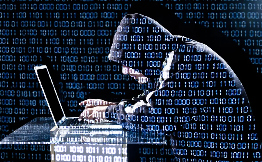 bigstock-Hacker-Typing-On-A-Laptop-44548564.jpg