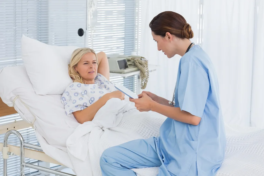 bigstock-Doctor-taking-care-of-patient--91889324.jpg