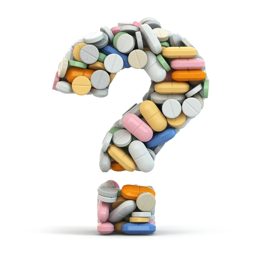 bigstock-Pills-as-question-on-white-iso-53360449.jpg