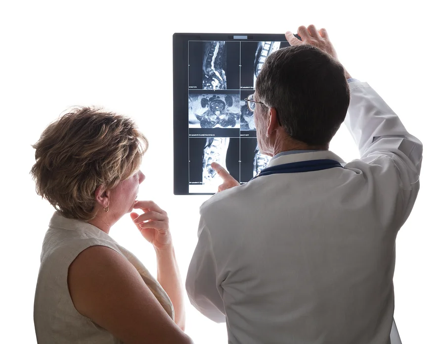 bigstock-Doctor-Viewing-Scans-With-Pati-4961552.jpg