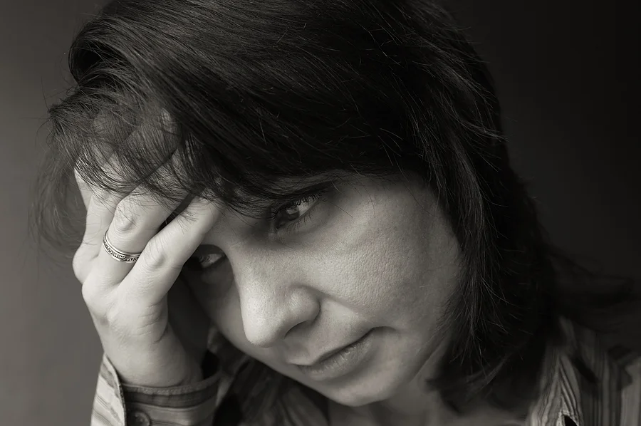 bigstock-Woman-with-a-painful-headache-27249356.jpg