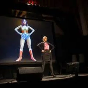 Amy Cuddy showing a Power Pose during her 2012 TED Global presentation.