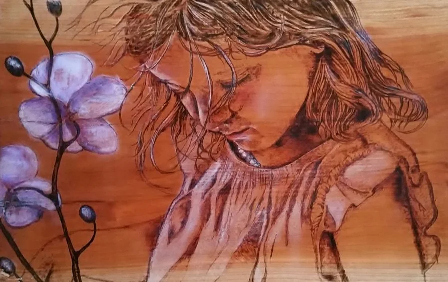 Young girl with flower.jpg