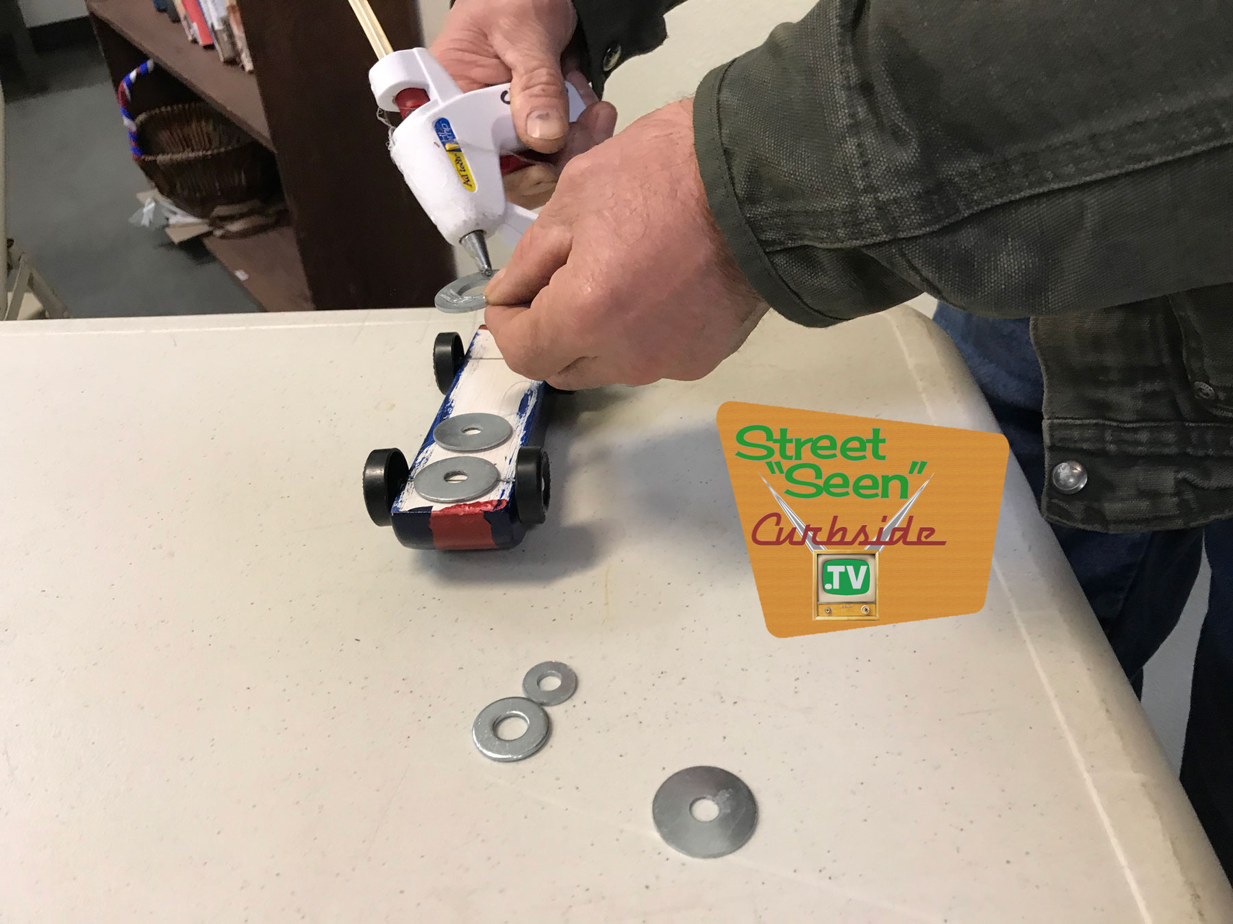 adding-weights-to-a-Pinewood-Derby-racer.jpg