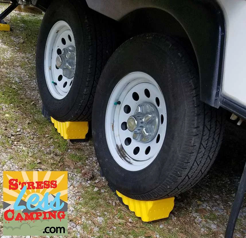 The Camco levelers on a two-axle trailer