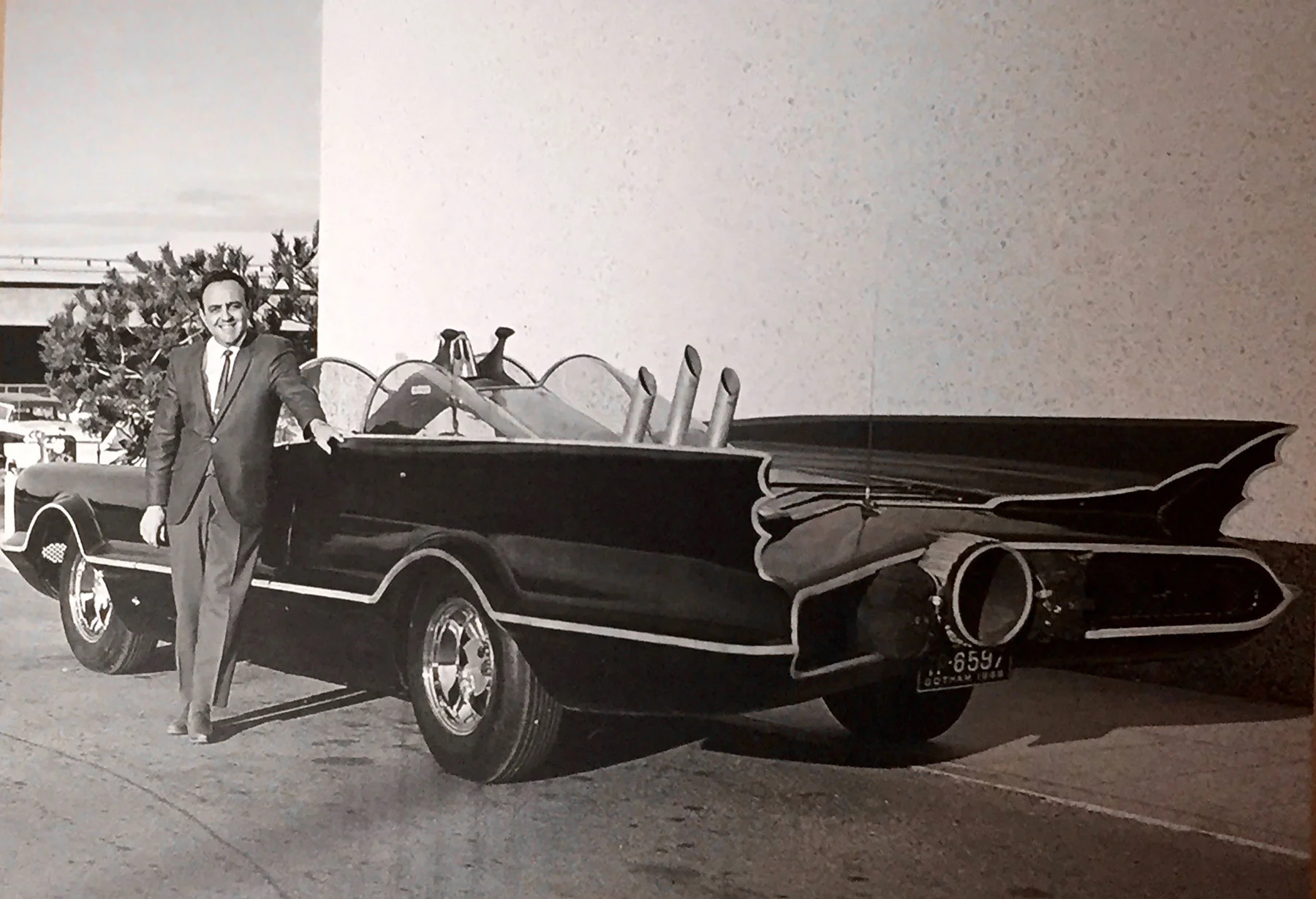 George Barris and the 1966 Batmobile he created from a Lincoln Futura show car.