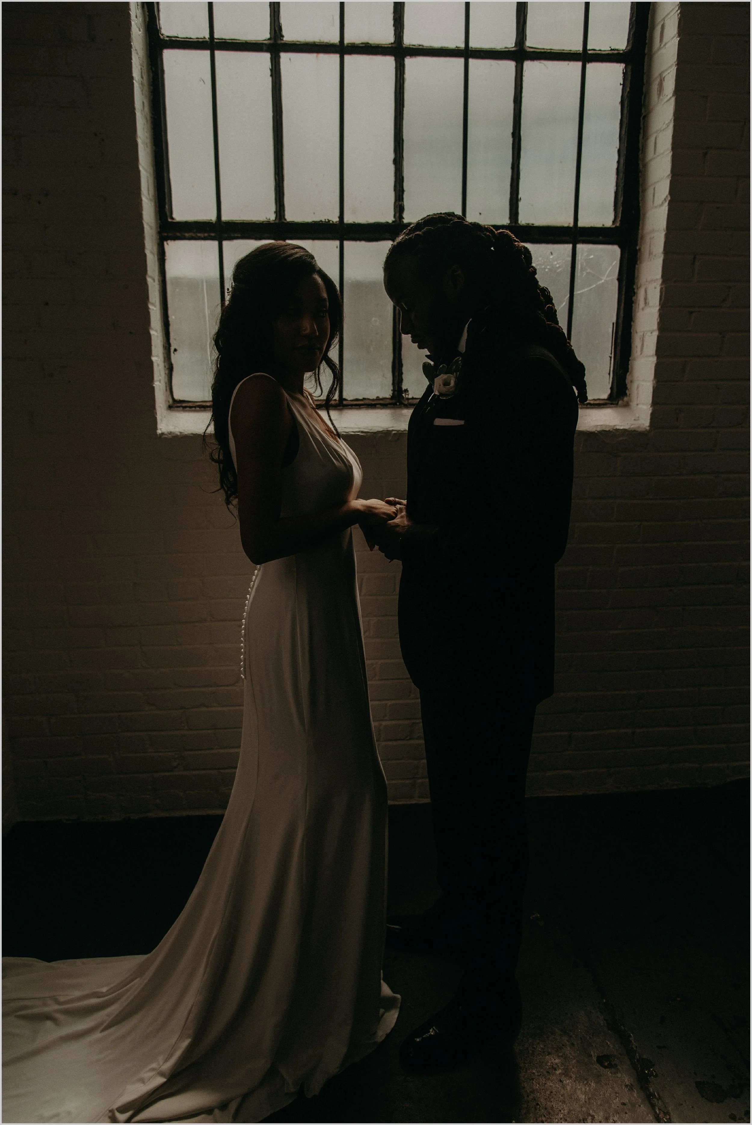 Unique wedding portraits inside Industrial White Loft