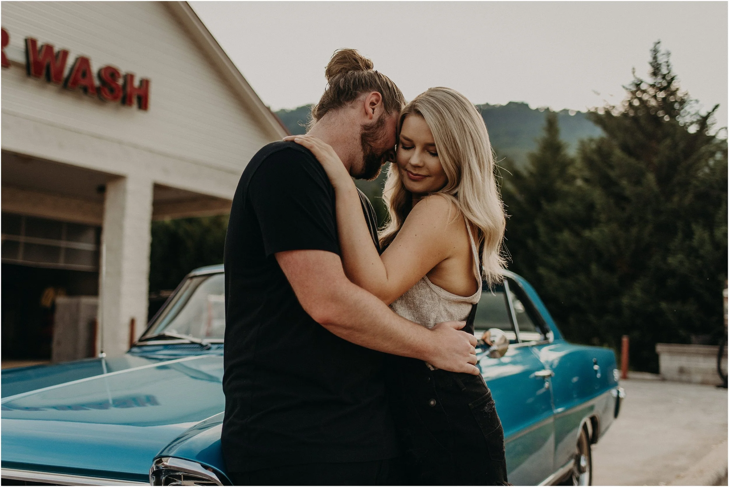 Lovely couple posing by vintage car. Outdoor wedding portrait. Royalty-Free  Stock Image - Storyblocks